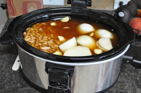 Everything except the salt goes into the crockpot (salt makes your beans tough).